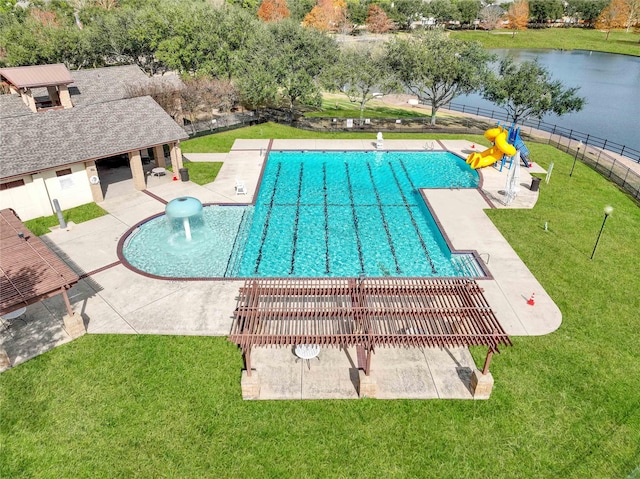 view of swimming pool featuring a patio, a water view, and a lawn