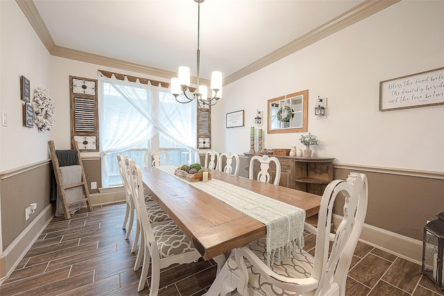 dining space featuring crown molding and a chandelier