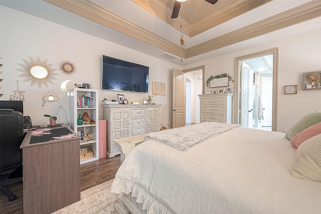 bedroom with crown molding, ceiling fan, and dark wood-type flooring