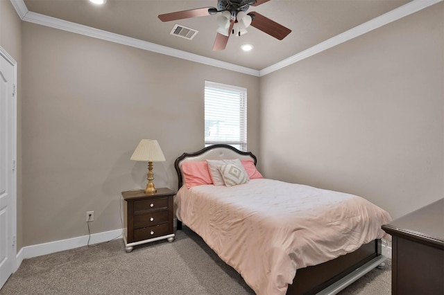 bedroom featuring ceiling fan, ornamental molding, and carpet