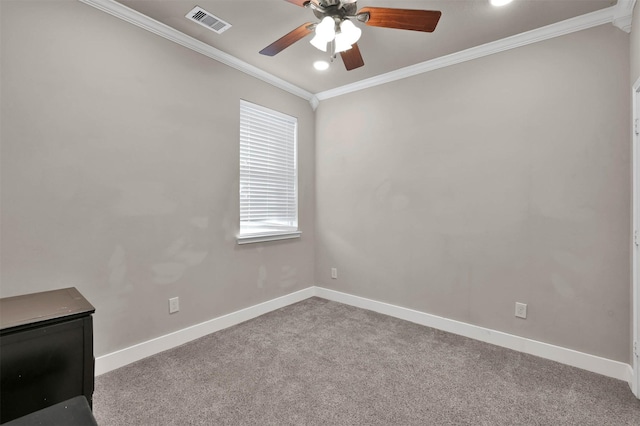 unfurnished room featuring crown molding, light colored carpet, and ceiling fan