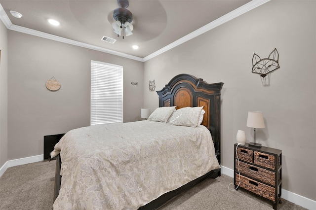 bedroom featuring crown molding, ceiling fan, and carpet