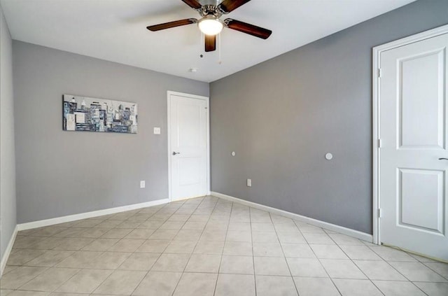 spare room with ceiling fan