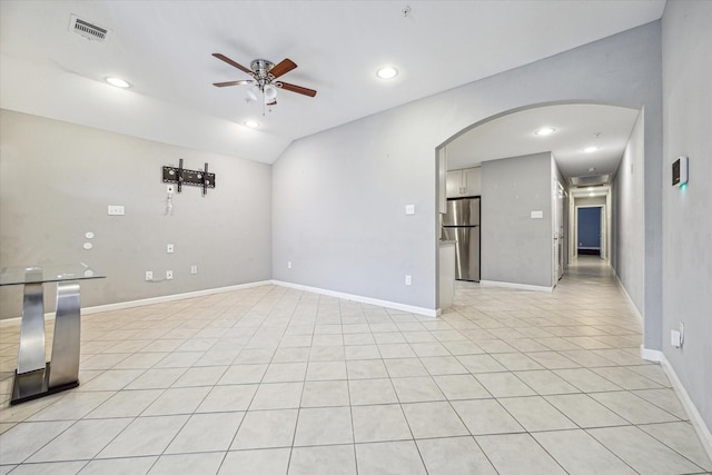 unfurnished room with lofted ceiling and ceiling fan