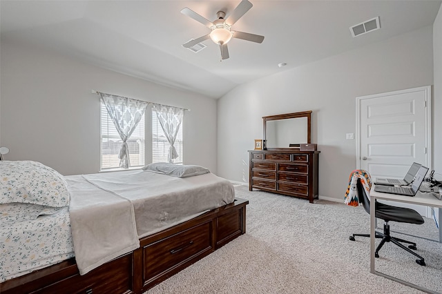 carpeted bedroom with ceiling fan and lofted ceiling