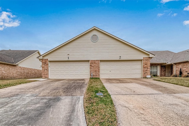 ranch-style house featuring a garage