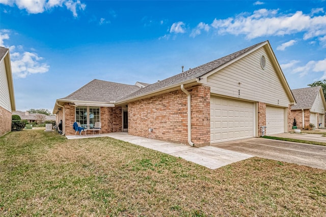 ranch-style home with a garage and a front yard