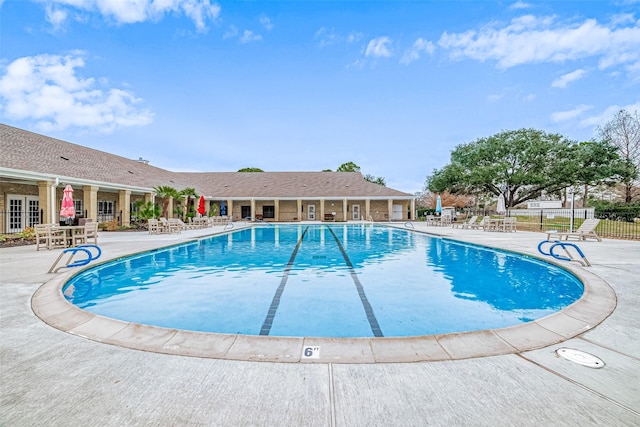 view of pool featuring a patio