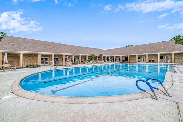 view of pool featuring a patio area