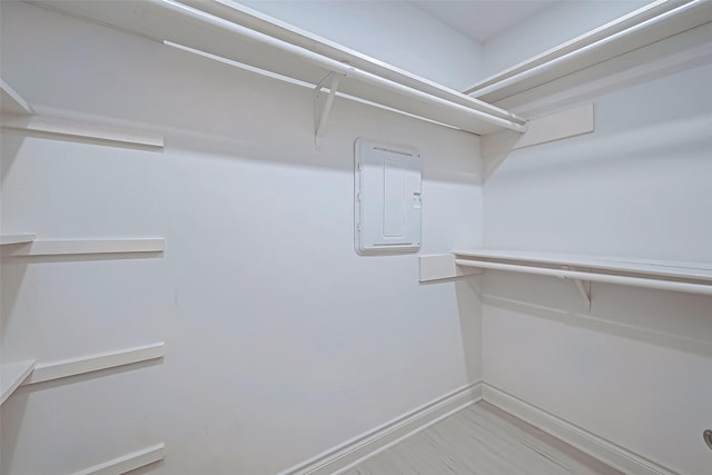 walk in closet with electric panel