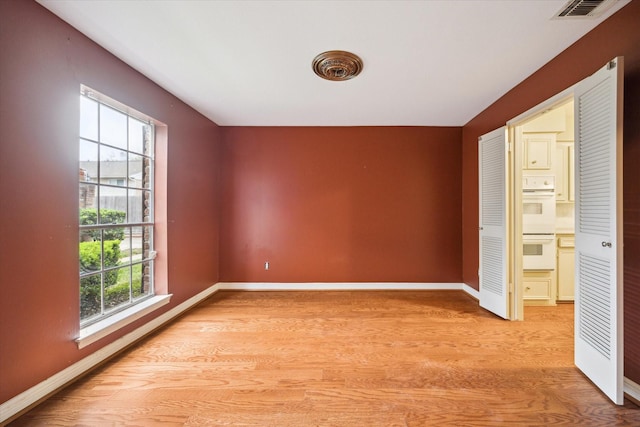 unfurnished bedroom with light hardwood / wood-style floors