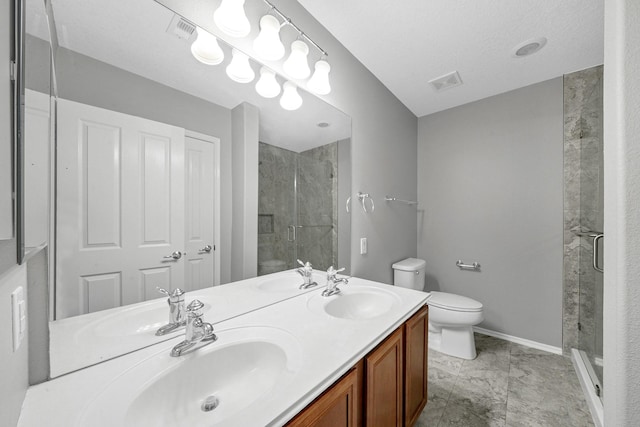 full bath featuring a shower stall, toilet, visible vents, and a sink