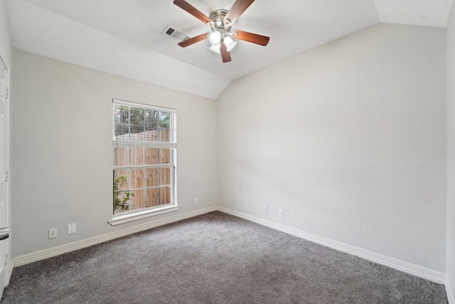 unfurnished room with ceiling fan, carpet flooring, and vaulted ceiling