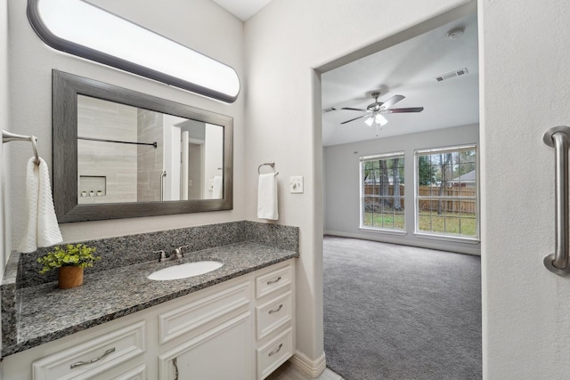 bathroom with vanity and ceiling fan