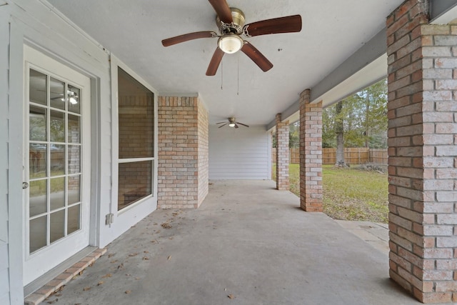 view of patio featuring ceiling fan