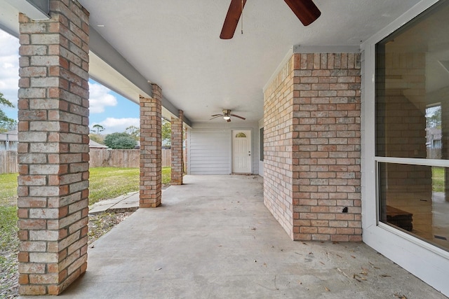 view of patio featuring ceiling fan