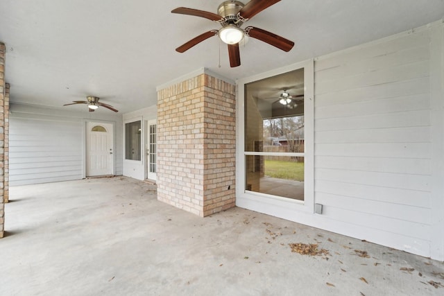 view of patio featuring ceiling fan