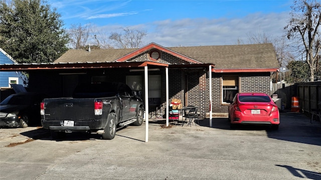 view of front facade featuring a carport