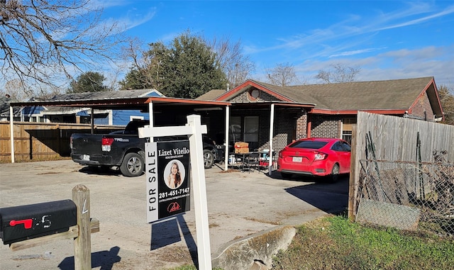 view of front facade featuring a carport