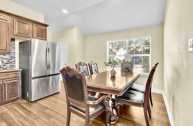 dining room featuring light hardwood / wood-style flooring