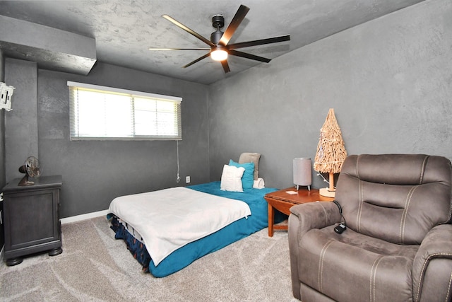 bedroom featuring ceiling fan and light colored carpet