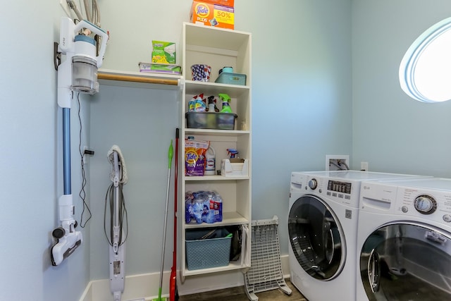 laundry area featuring washing machine and clothes dryer