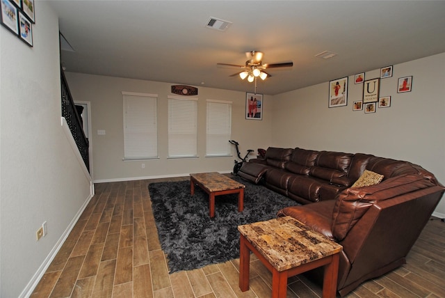 living room featuring ceiling fan