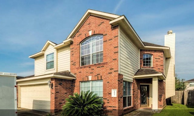 view of front of home with a garage