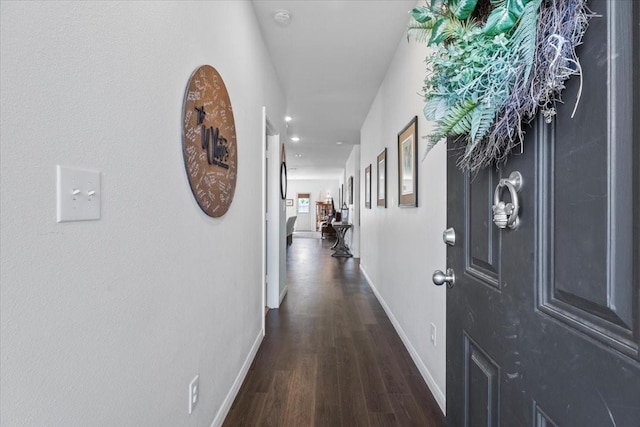 hall featuring dark wood-type flooring