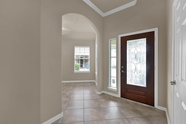 tiled entryway with crown molding