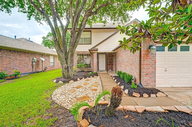 front of property featuring a garage and a front yard