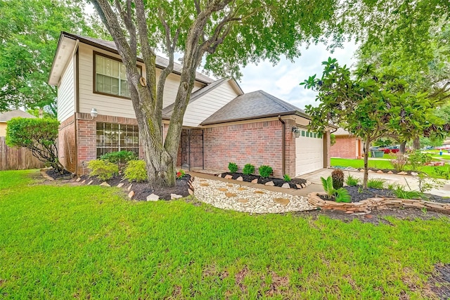 view of front of home featuring a garage and a front yard