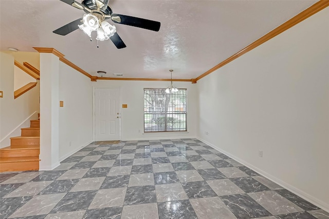 unfurnished living room with ornamental molding and ceiling fan with notable chandelier