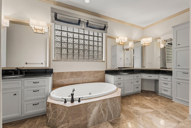 bathroom with vanity, crown molding, and tiled bath