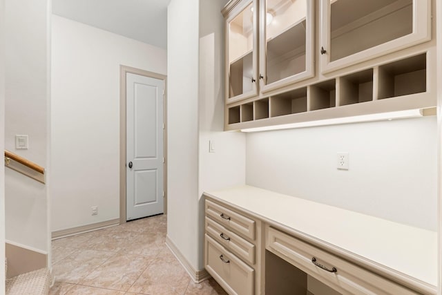 interior space with light tile patterned floors