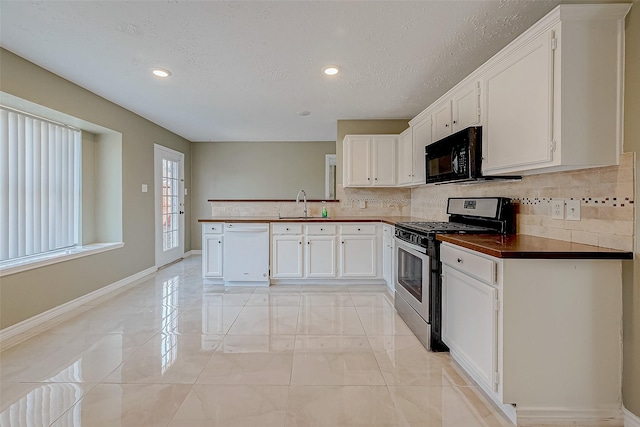 kitchen with stainless steel range with gas stovetop, dishwasher, and white cabinets