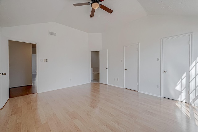 interior space featuring vaulted ceiling, ceiling fan, and light wood-type flooring