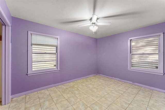 unfurnished room with ceiling fan