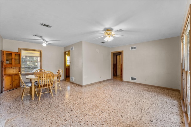 dining room with ceiling fan