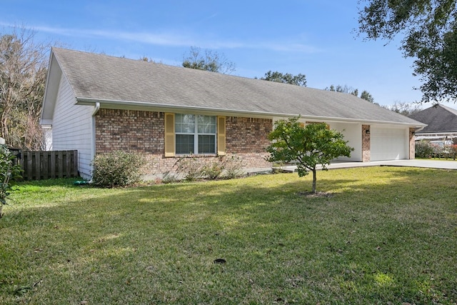 ranch-style home with a garage and a front yard