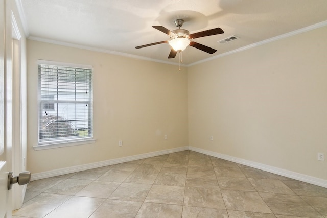 empty room with crown molding, plenty of natural light, and ceiling fan