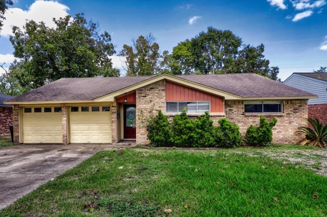 single story home with a garage and a front lawn