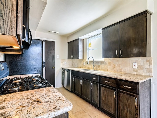 kitchen featuring sink, dark brown cabinets, dishwasher, and range