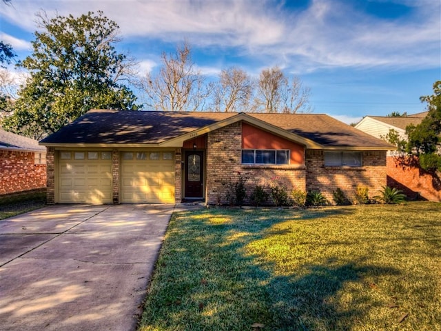 ranch-style home featuring a garage and a front lawn