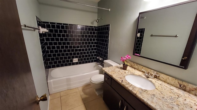 full bathroom with tile patterned flooring, vanity, toilet, and tiled shower / bath