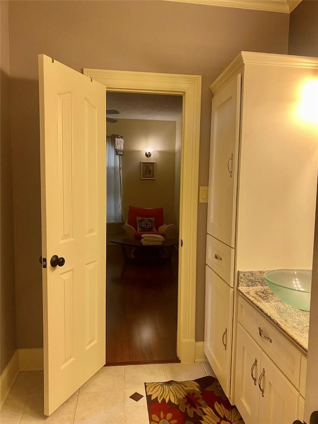 bathroom with vanity and tile patterned floors