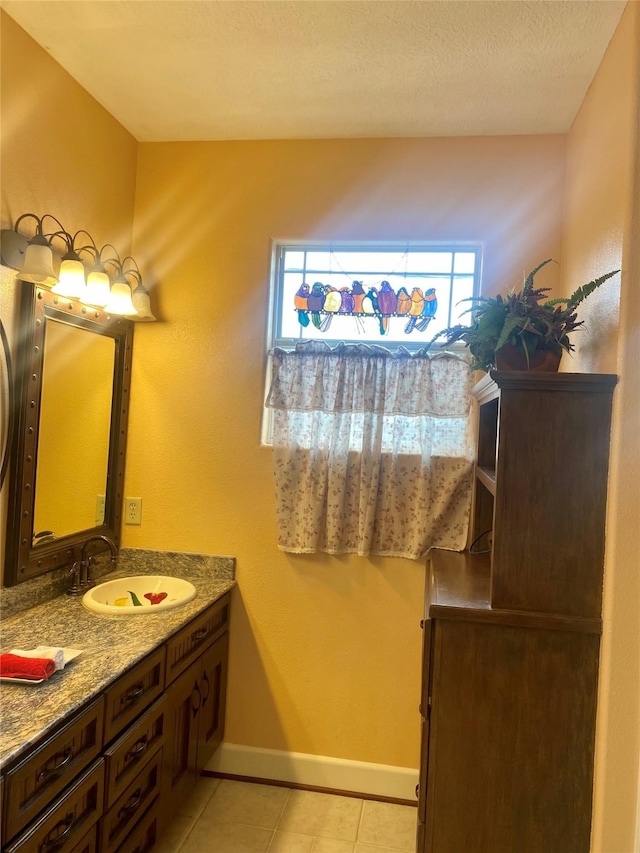 bathroom featuring vanity and tile patterned flooring