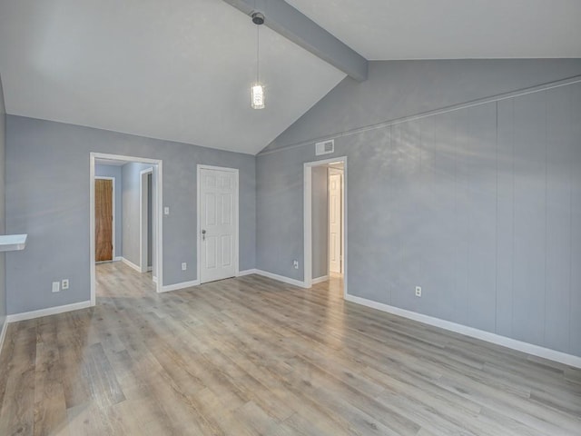 interior space with high vaulted ceiling, beam ceiling, and light hardwood / wood-style floors