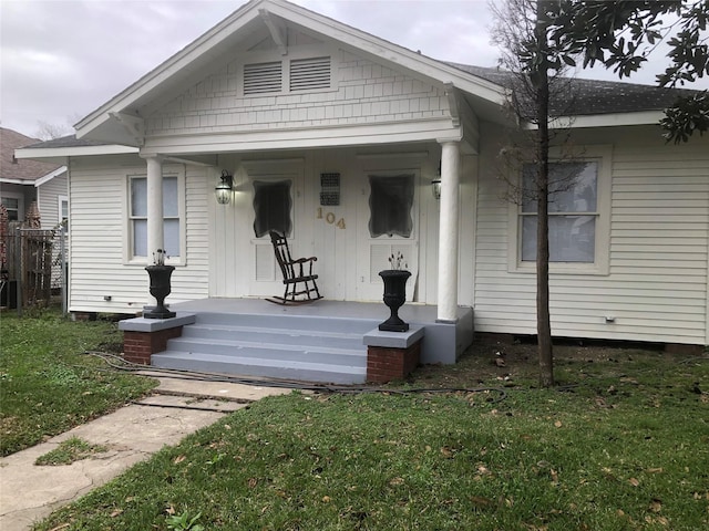 bungalow with a front lawn