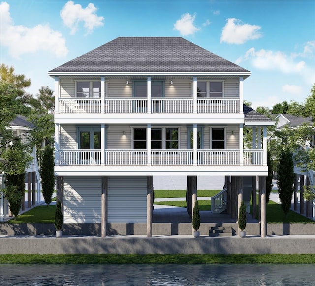 back of property featuring a water view, a balcony, and french doors